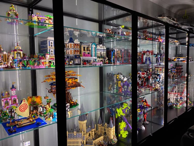 Purchase a statement toy cabinet for your toy collection like the Showfront TSF2400 display case.