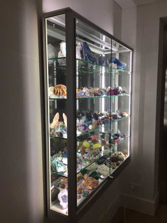 Wall mounted display cabinet for crystals