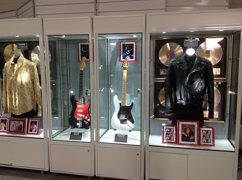 A rock n’ roll music exhibition used Showfront music memorabilia display cabinets. 