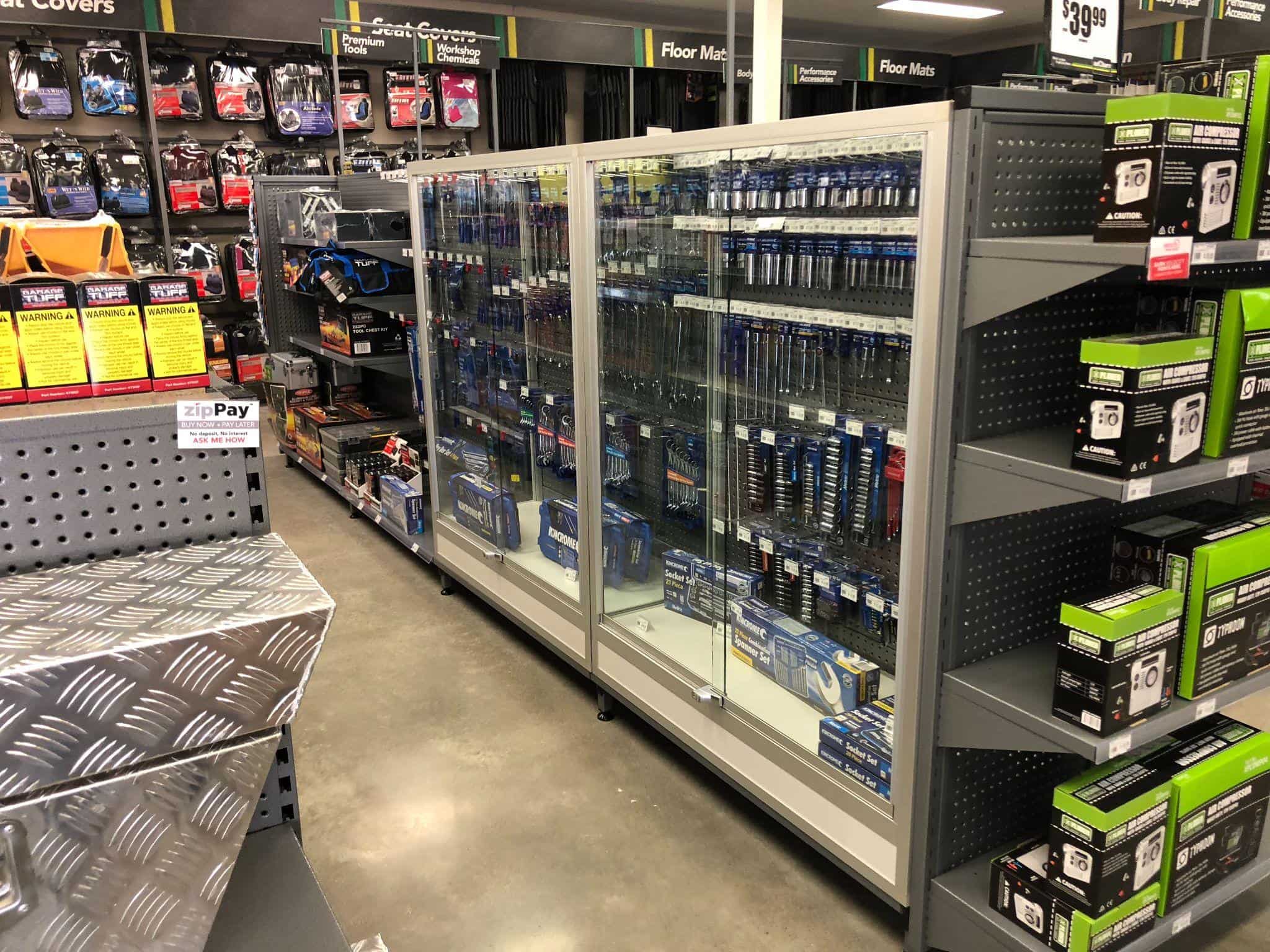 Practical automotive business display shelving and cabinets designed and installed by Showfront.