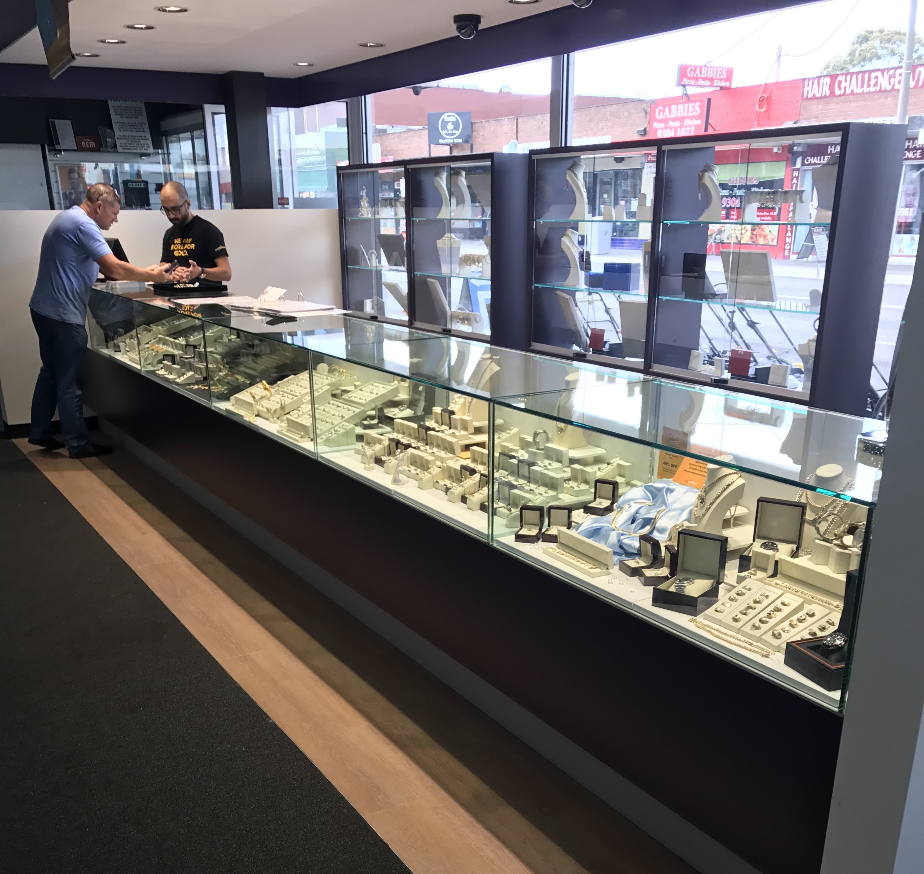 Elegant jewellery store display cabinets and shelving designed and installed by Showfront.