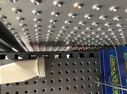 Showfront's MDR shop shelving-  Hole Back Panel close up