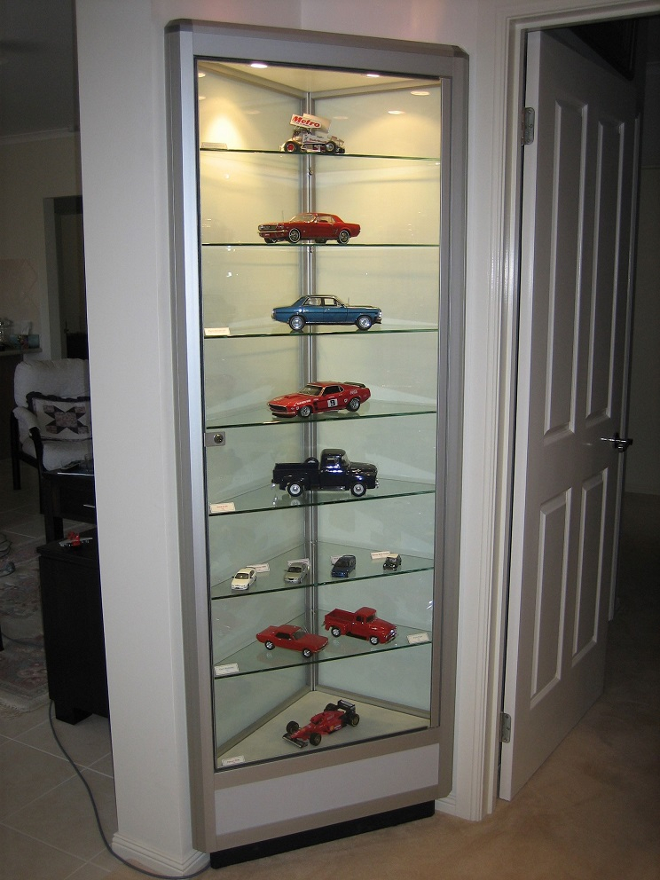 This custom corner model car display case was the ideal solution for this Showfront customer 