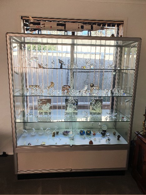 Nikki keeps her crystals in a white Showfront TSB1500 customised upright Swarovski display case with light.