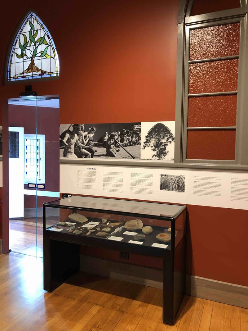 Local Kabi Kabi ancient indigenous artifacts are displayed in a Showfront display case at the Eumundi Museum. 