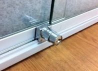 Security lock on fabric notice boards